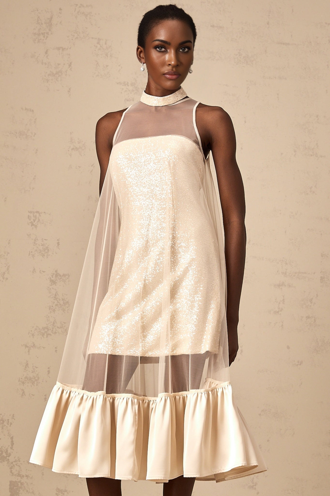 A layered midi dress with a tulle panel and sequin embellishments named Josette