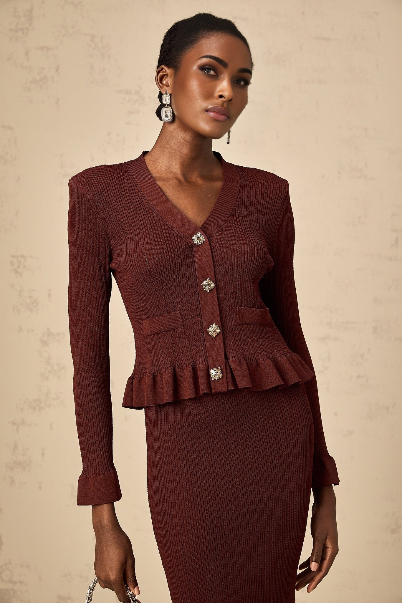 Heres a simple alt text for the product image based on the given title
Red knit matching set with ruffled top and skirt called Corrine
