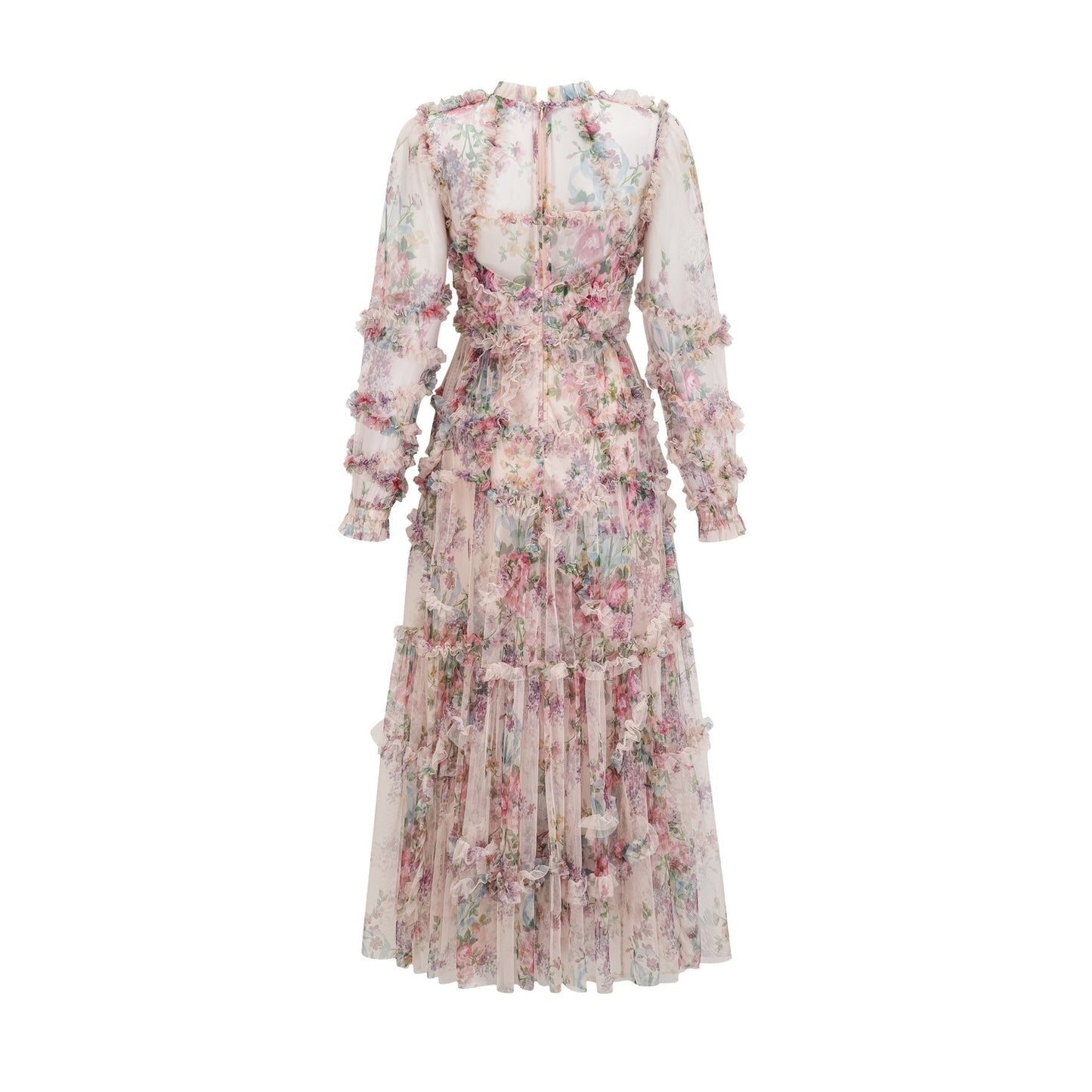 Woman wearing a lightcolored floral midi dress with ruffled details and tulle fabric standing in a neutral background
