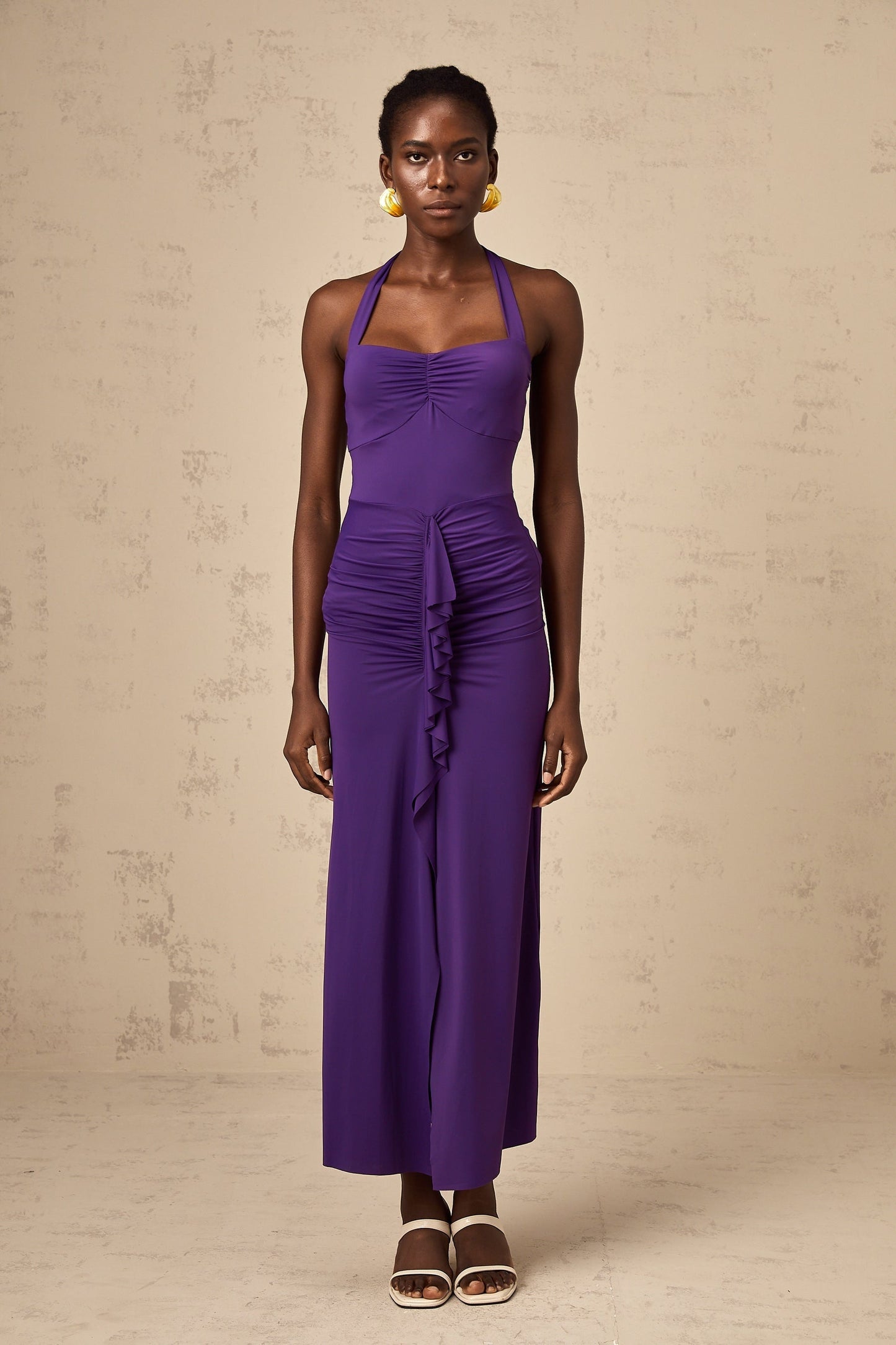 A purple halterneck midi dress with ruched detailing named Renata