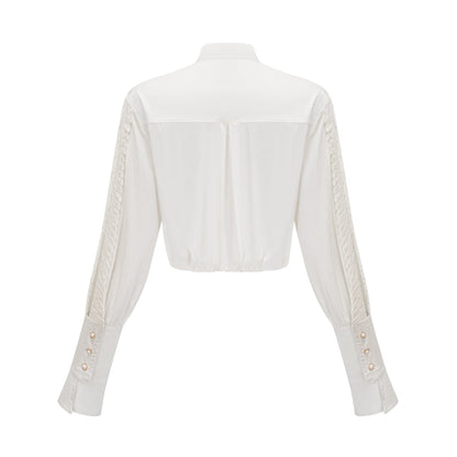 Céleste white pleated scarfcollar shirt