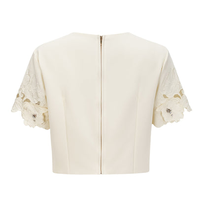 Beige matching set with 3D floral details on top and skirt