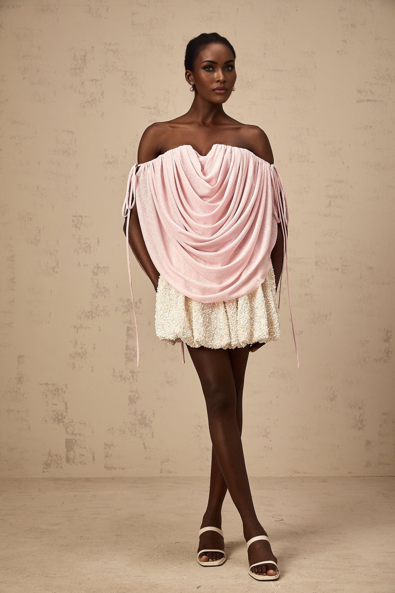 A pink offshoulder top with ruched detailing named Quintina