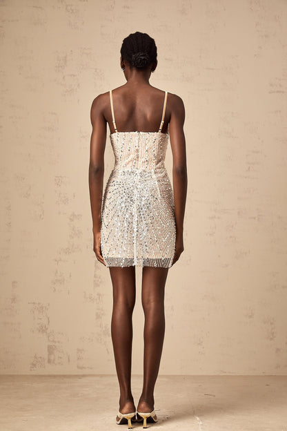 A short beaded mini dress featuring butterfly motifs and a Christine design