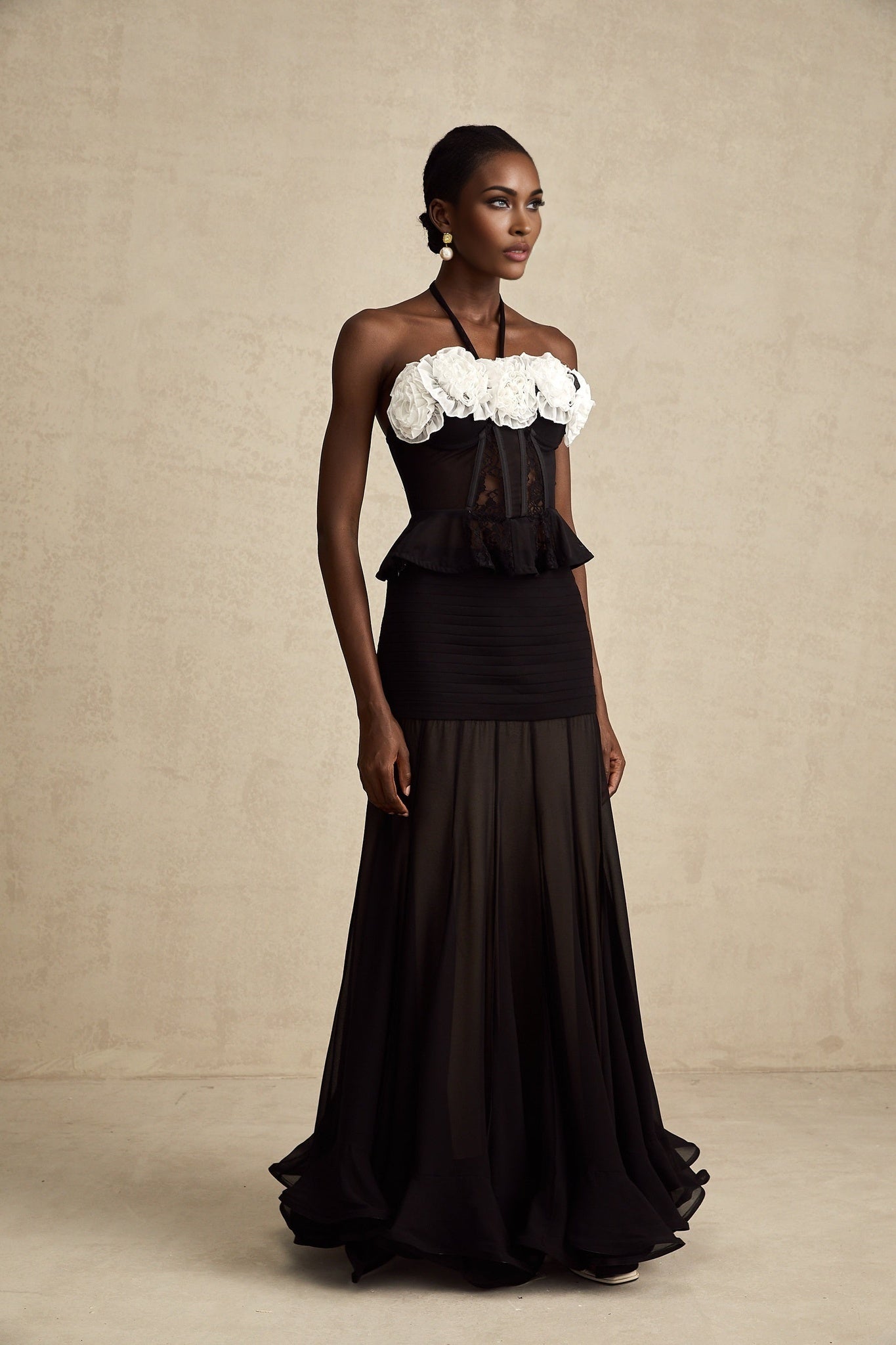 Elegant black corset top with faux flower lace pattern and delicate straps