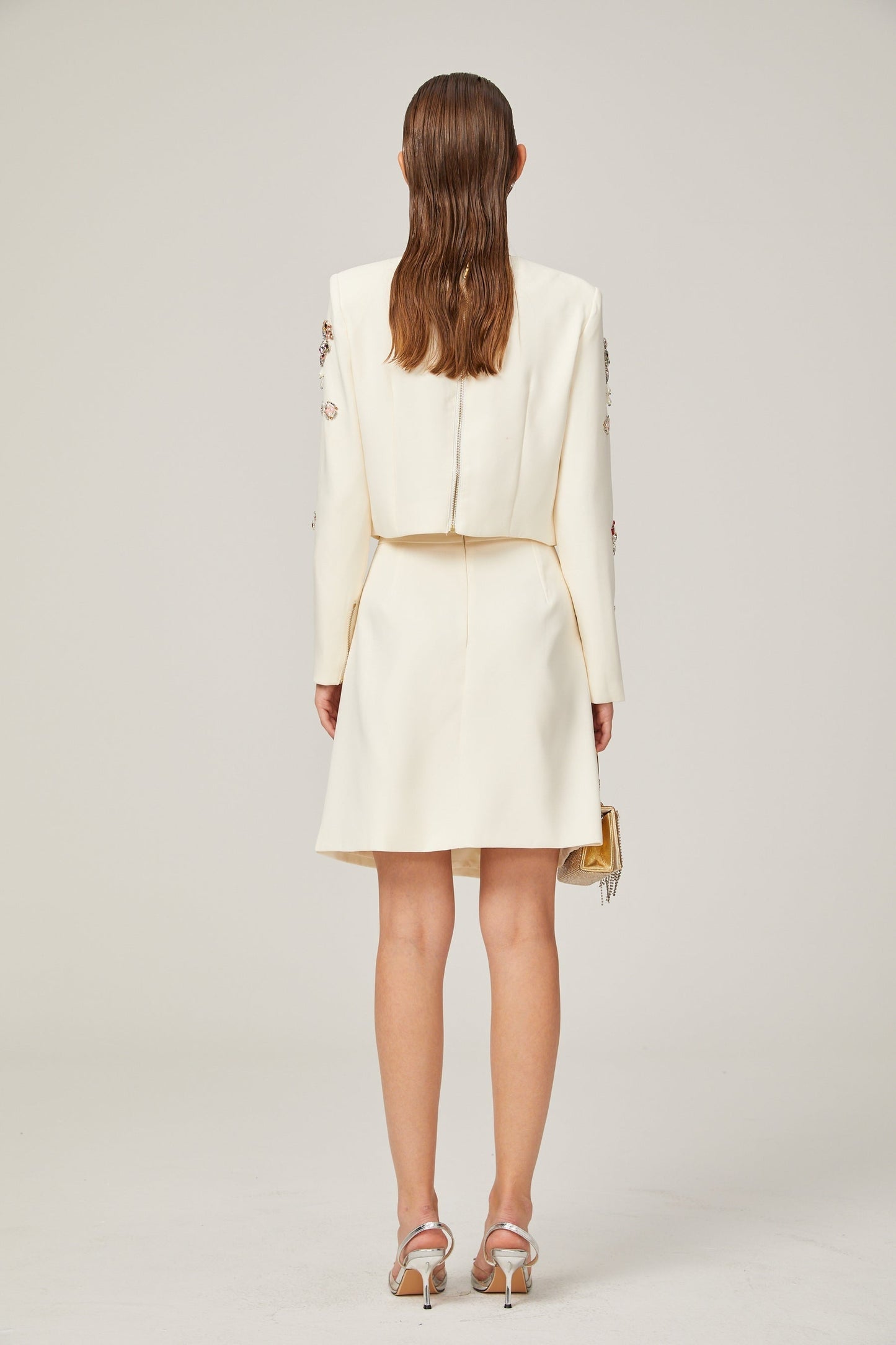 Jeanne white crystalembellished top  skirt matching set