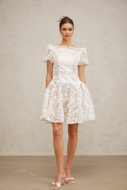 White mini dress with floral lace pattern and puff sleeves Josette design