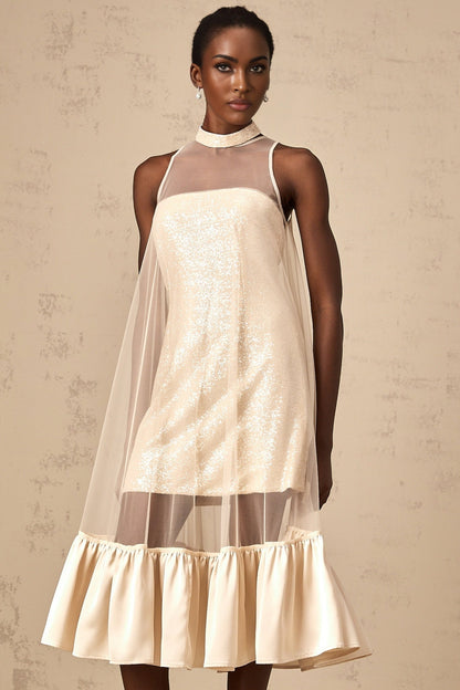 A layered midi dress with a tulle panel and sequin embellishments named Josette