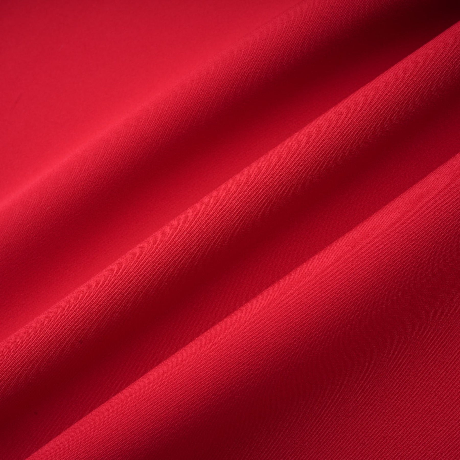 A red maxi dress with a high slit and pleated design suitable for Valentines Day occasion