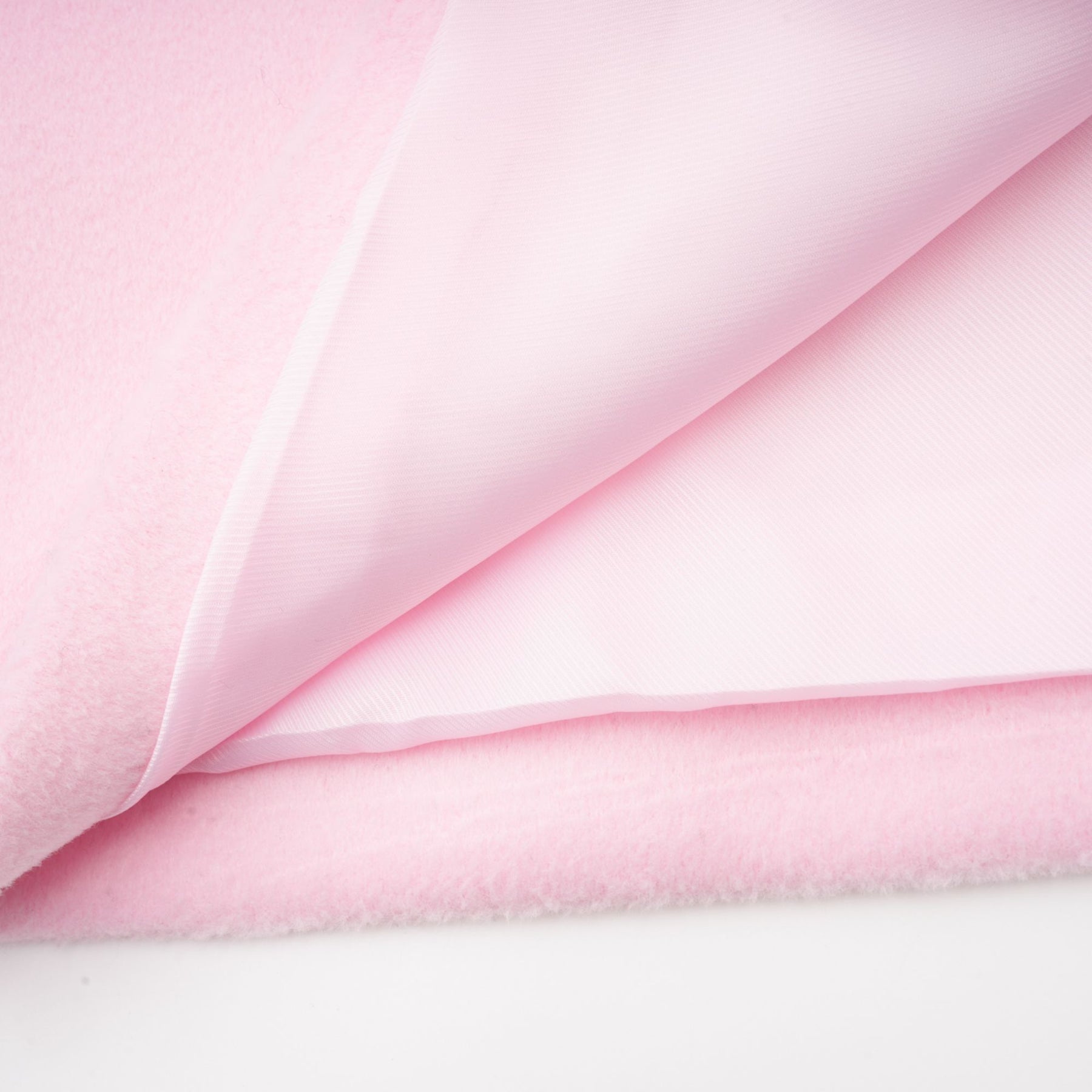 A pink faux fur overcoat with a plush texture and long length named Louisette
