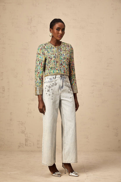 A goldtoned tweed jacket with a checked pattern and sequin embellishments