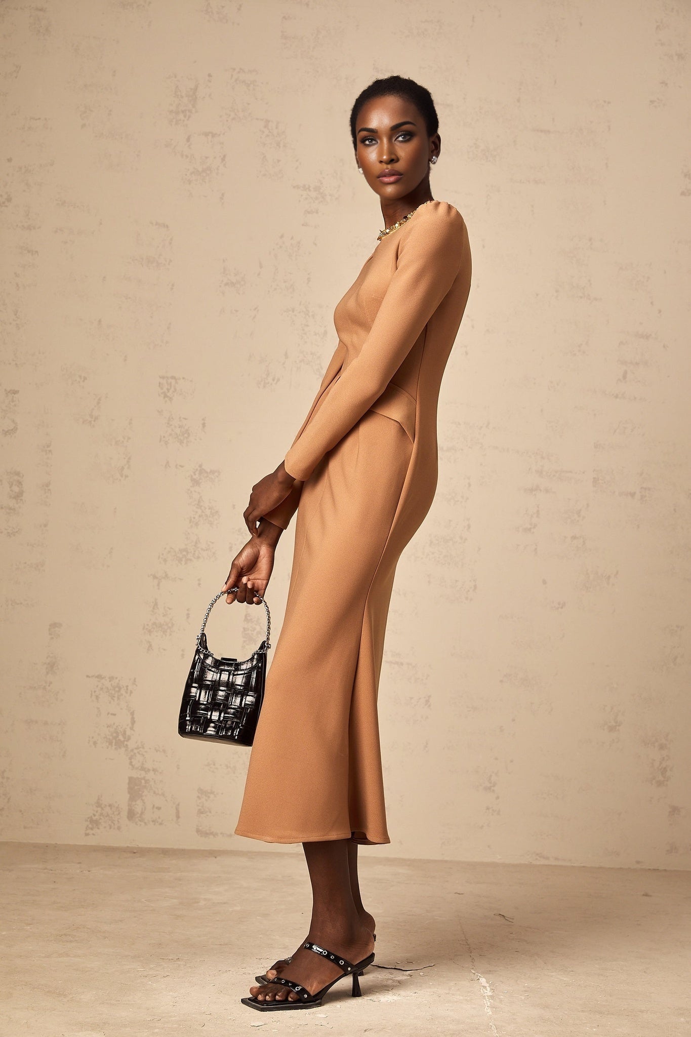 A khaki colored midi dress with sequin embellishments named Doriane