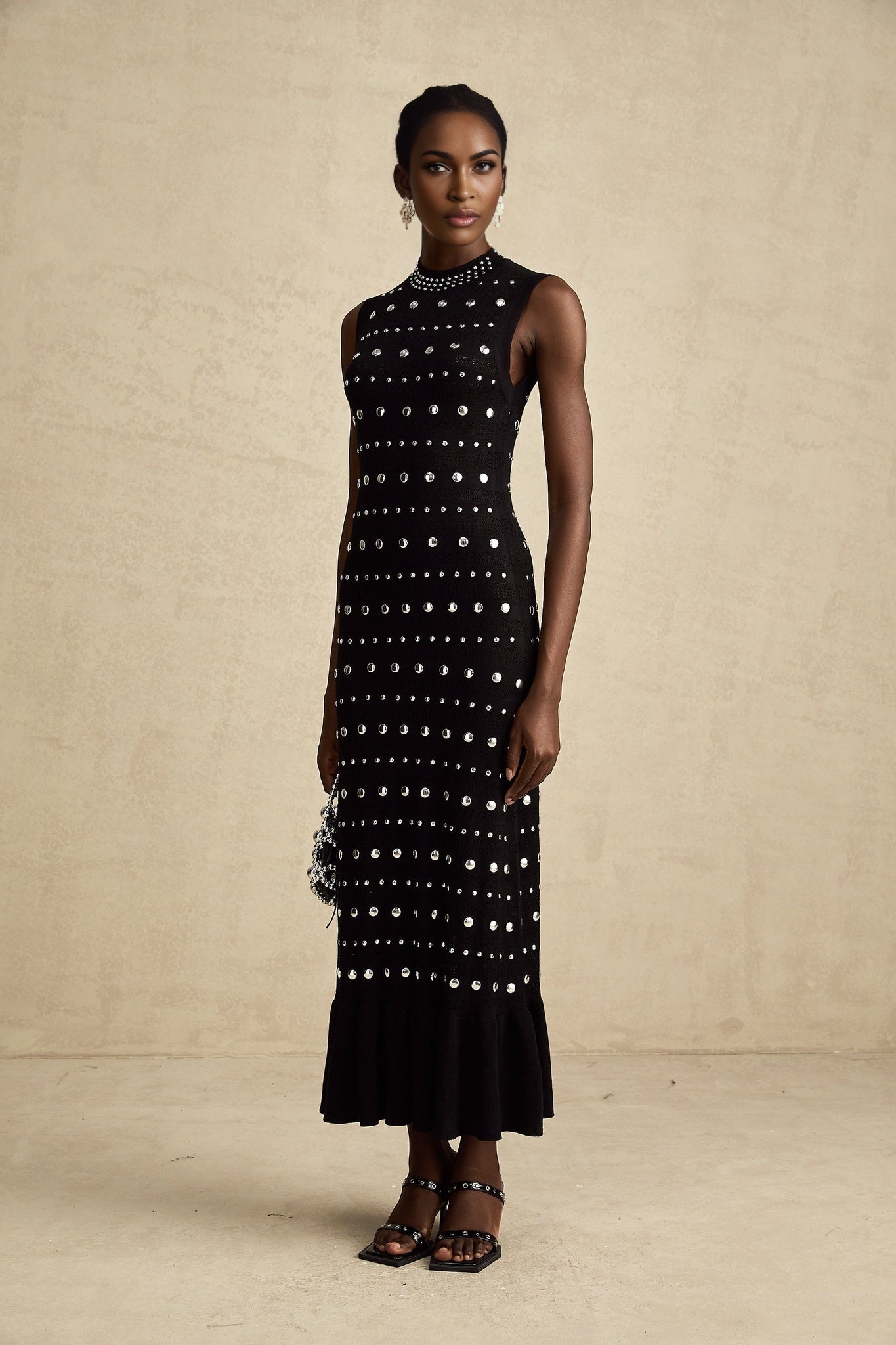 Black crochet knit maxi dress with studs by Chloe