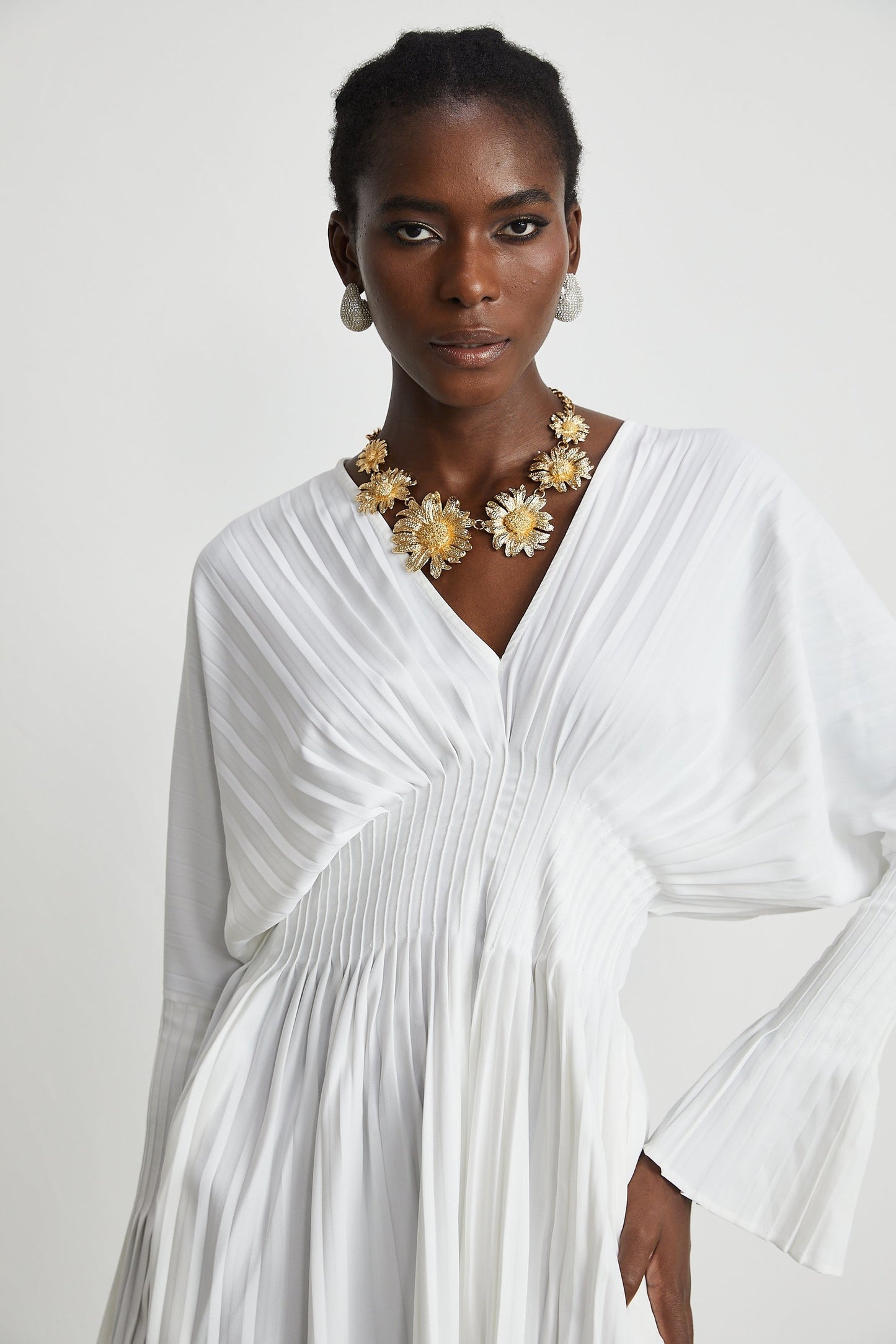 Claudette Vneck pleated mini dress