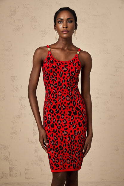 A red mini dress with a leopard print pattern made from shimmering lurex fabric featuring a short hemline and likely sleeveless design