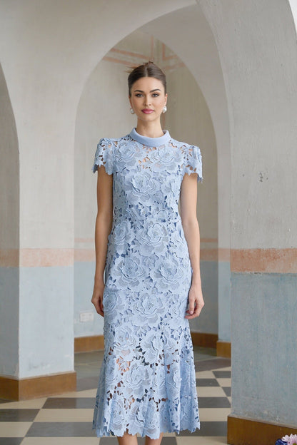 Elegant blue midi dress with delicate floral lace applique details and feminine silhouette