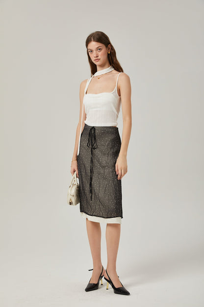 Gisèle tiewaisted polkadot print skirt