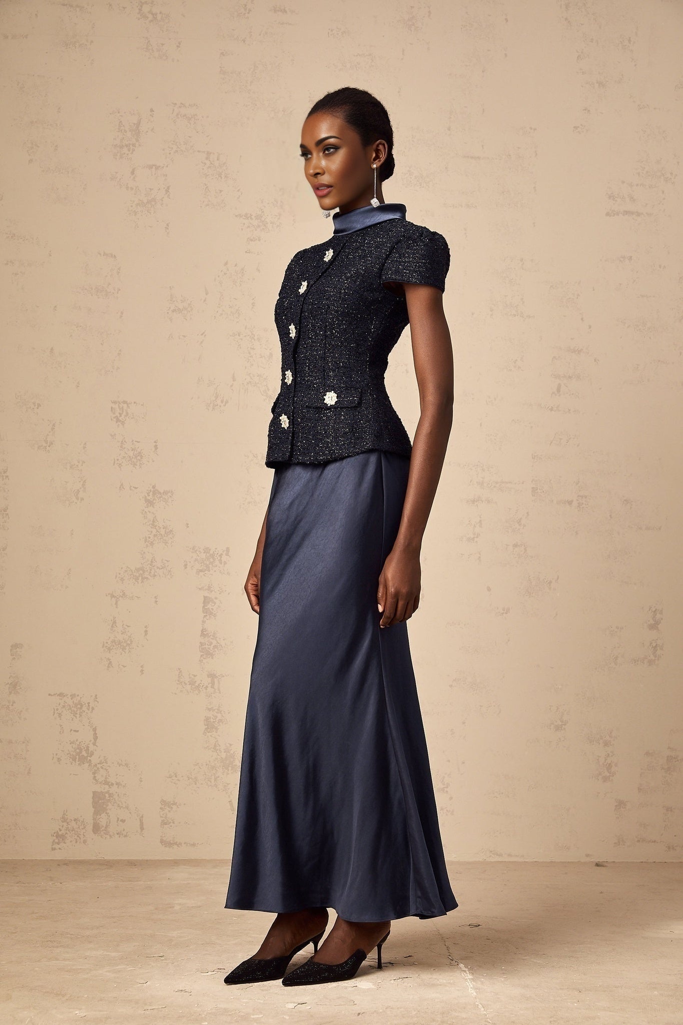 A blue maxi dress with a peplum waist and panelled design called Josette