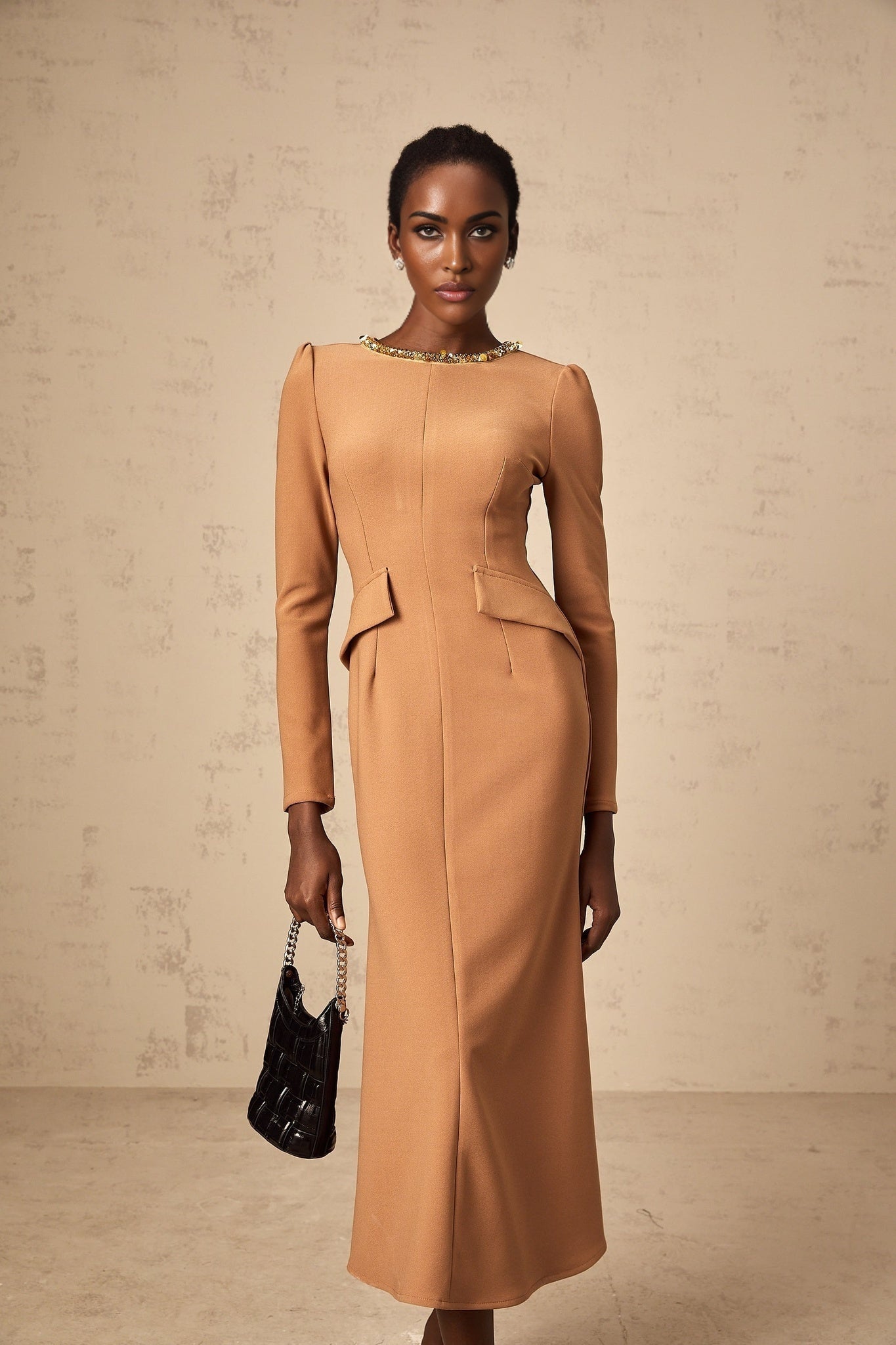 A khaki colored midi dress with sequin embellishments named Doriane