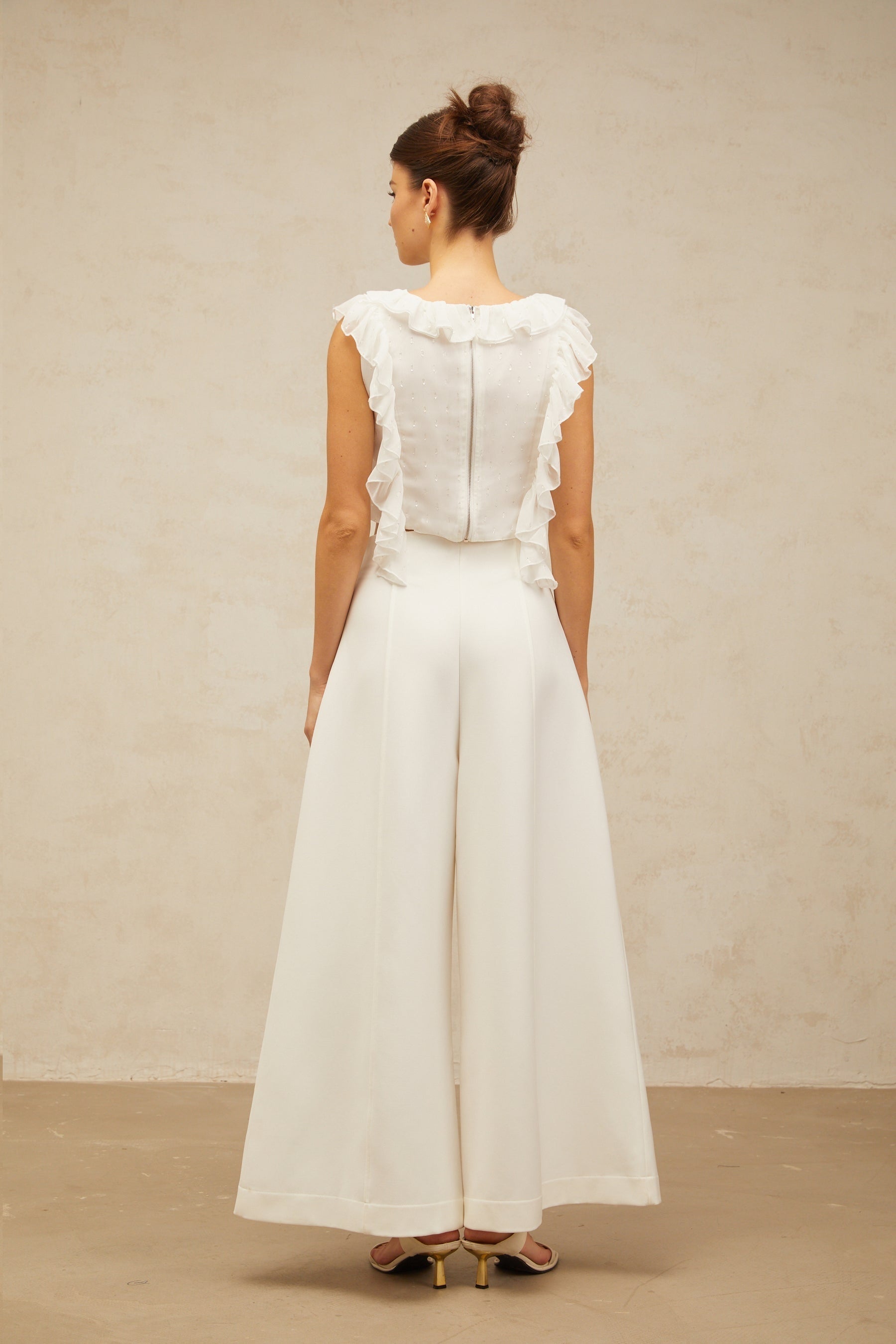 White cropped chiffon top with bowknot and ruffle details