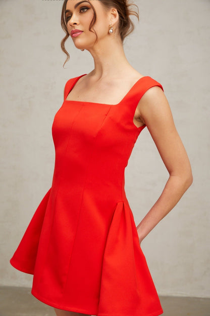 A red mini dress with a square neckline and puff sleeves in a Margherita style