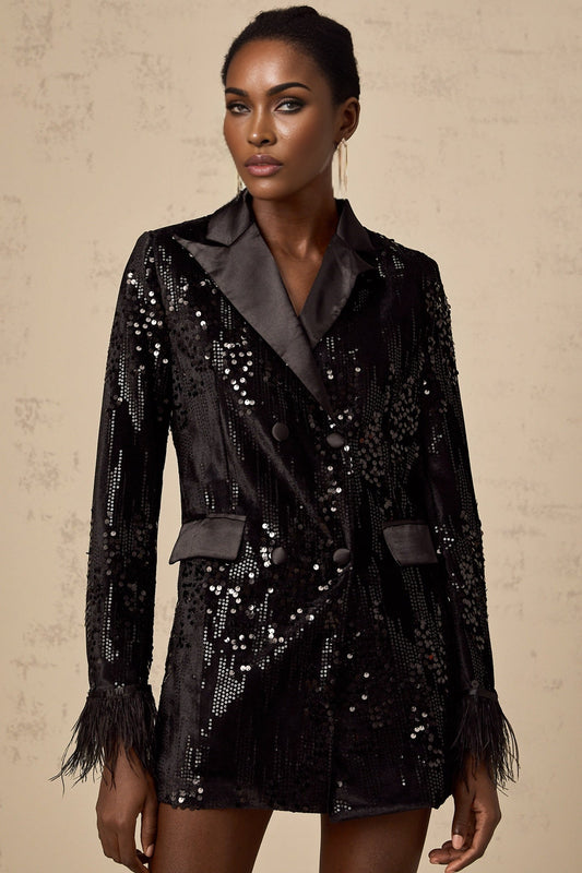 A black blazer with sequin embellishments and feather trim along the edges named Ariane