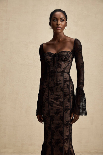 Elegant black lace maxi dress with flared Marlene style silhouette and full length skirt