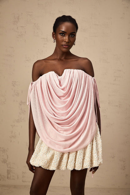 A pink offshoulder top with ruched details called Quintina