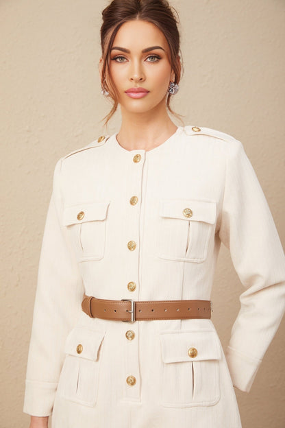 Woman wearing white long sleeve tweed bodysuit with button details and high neckline