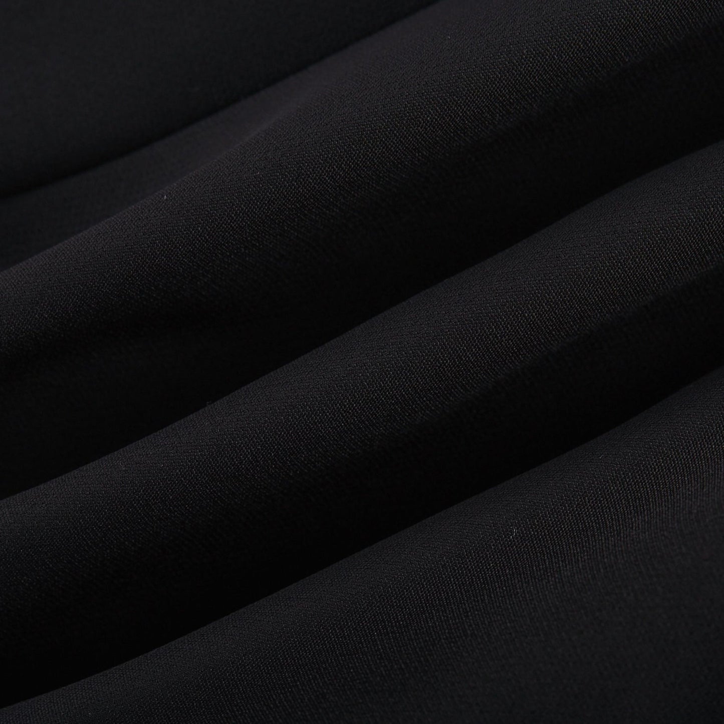 Black mini skirt with artificial flowers by Nalini