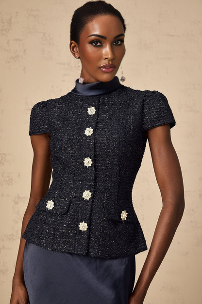 A long blue maxi dress with a peplum waist and panelled design featuring the Josette style