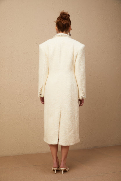 Long cream colored tweed coat with wool fabric and faux pearl embellishments