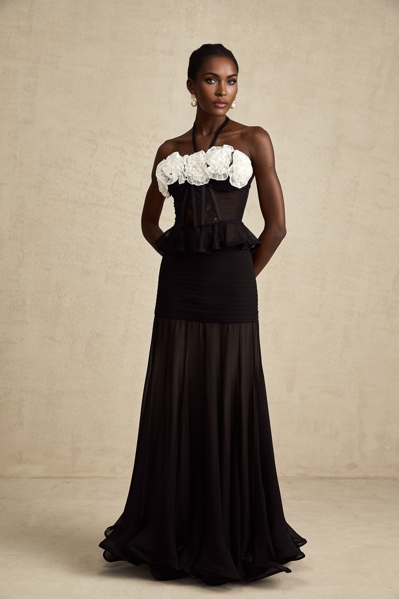 Black corset top with faux flower lace design and intricate floral pattern