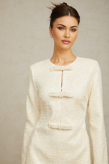 White sequined tweed mini dress with short sleeves and a classic silhouette