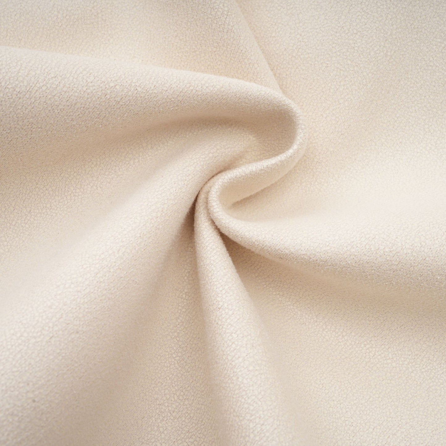 Woman wearing white suede short coat with fur trim and padded design