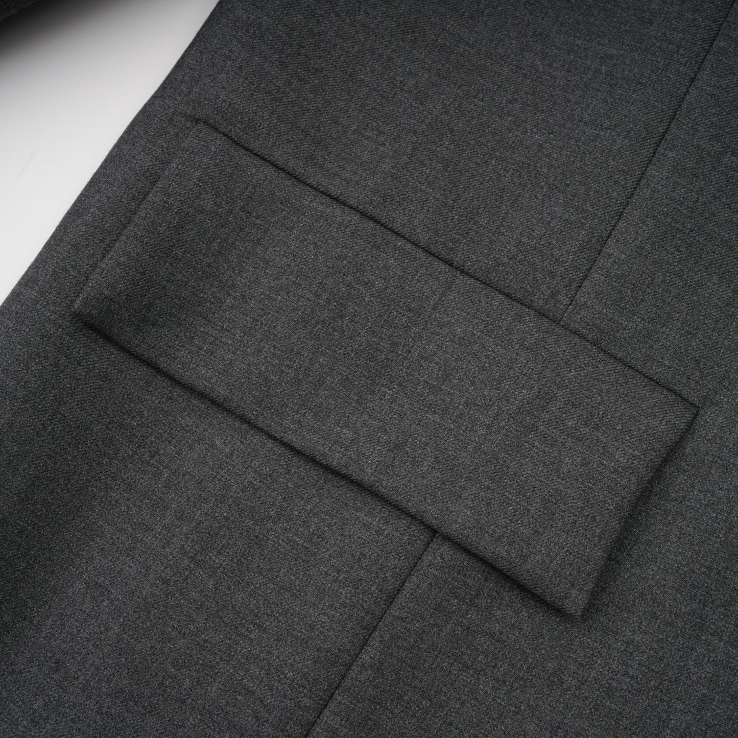 A grey blazer with lace panel details