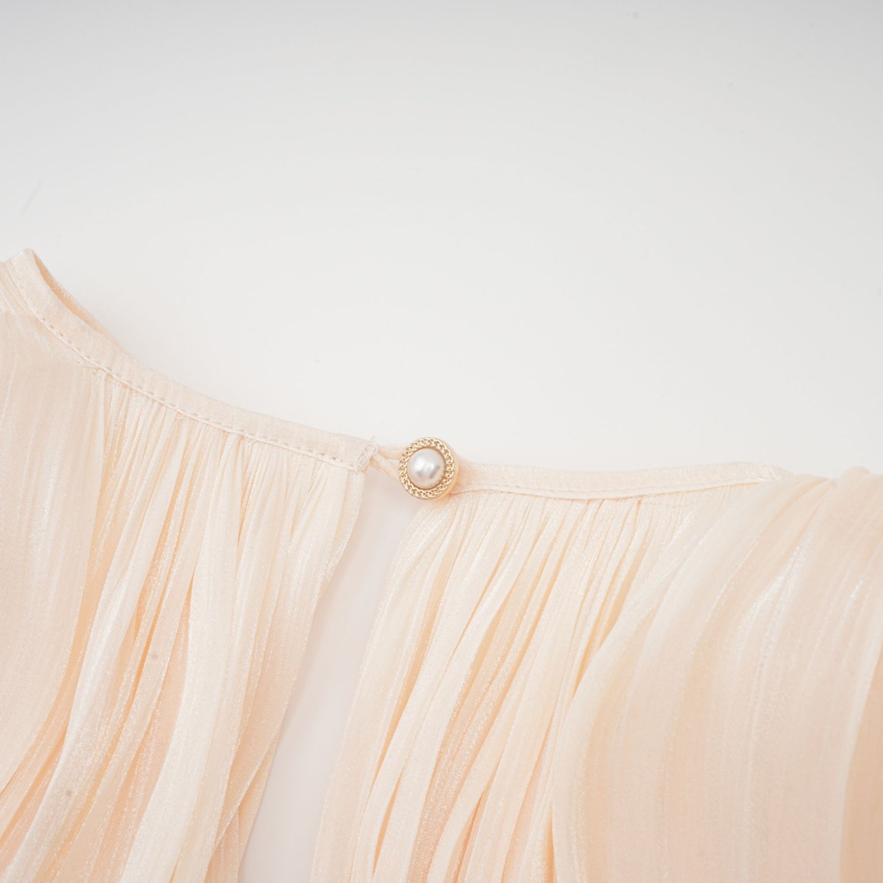 Eugénie fullypleated ruffled mini dress in Neutrals