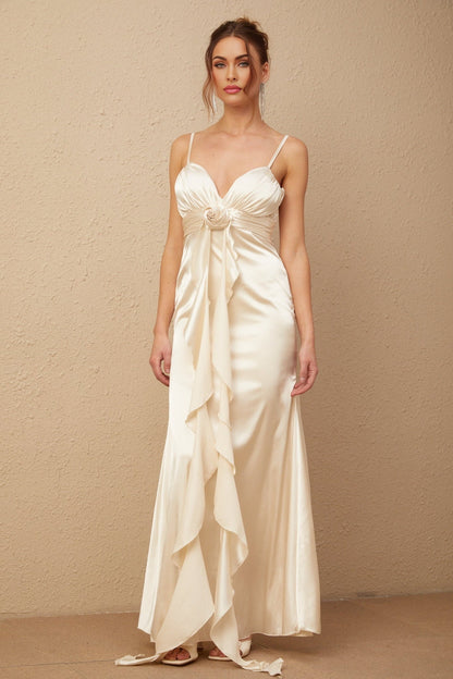 A long satin maxi dress with a corset bodice featuring floral applique details and a floral pattern throughout the fabric
