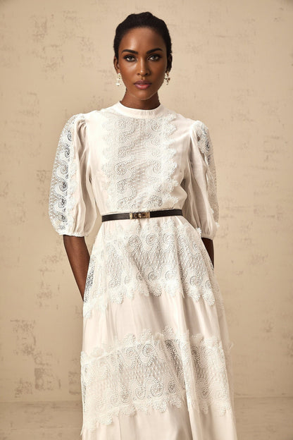 White midi dress with lace trim panels and belt at waist
