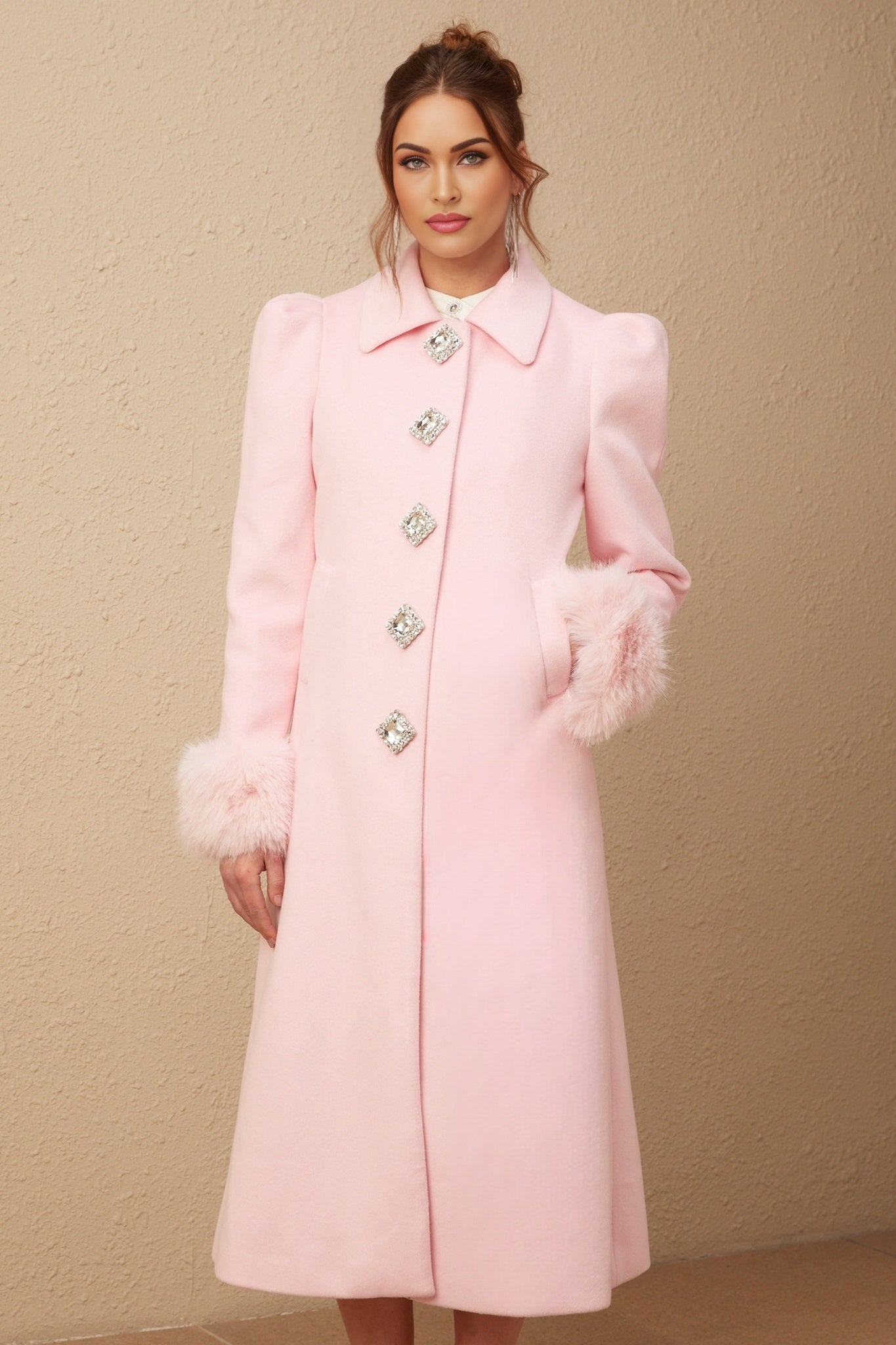 A pink faux fur overcoat with a feminine design named Louisette