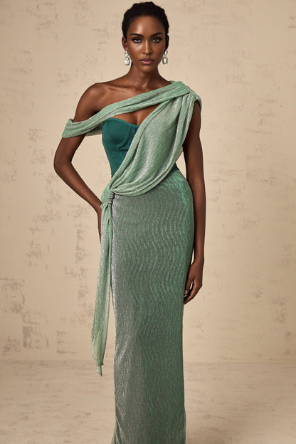 A green maxi dress with corset bodice featuring ribbon design details and long flowing skirt