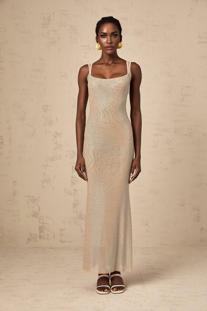 A long elegant maxi dress with crystal embellishments and an open back design