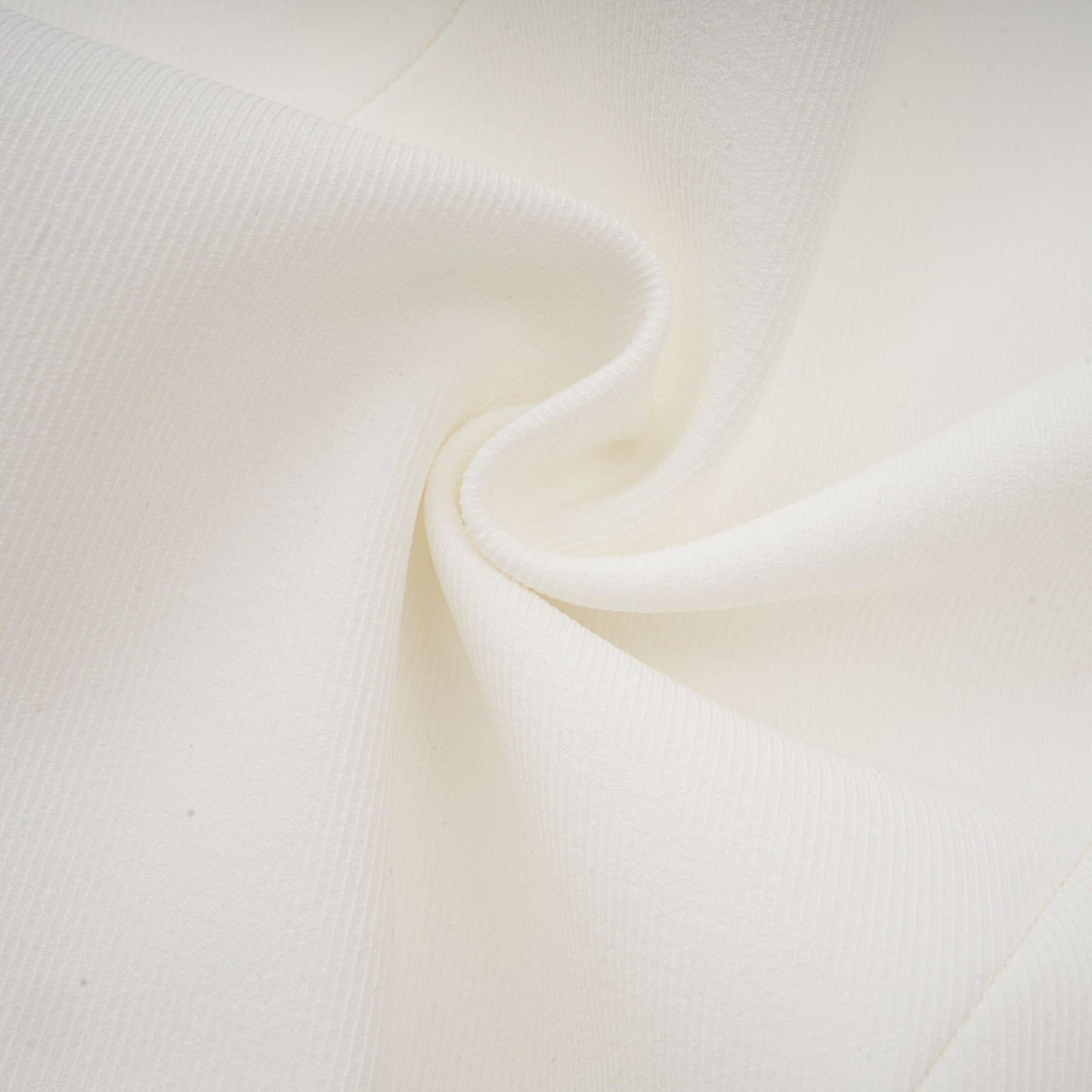 A white mini dress with a bubble skirt and fitted bodice named Elodie