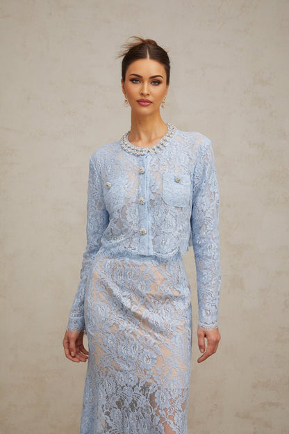 Ariane matching set with blue floral lace top and skirt on white background