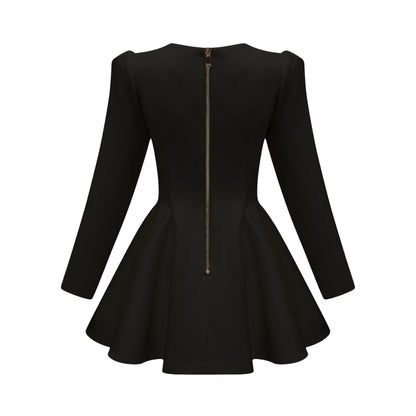 Woman wearing black blazer dress with pleated peplum hem