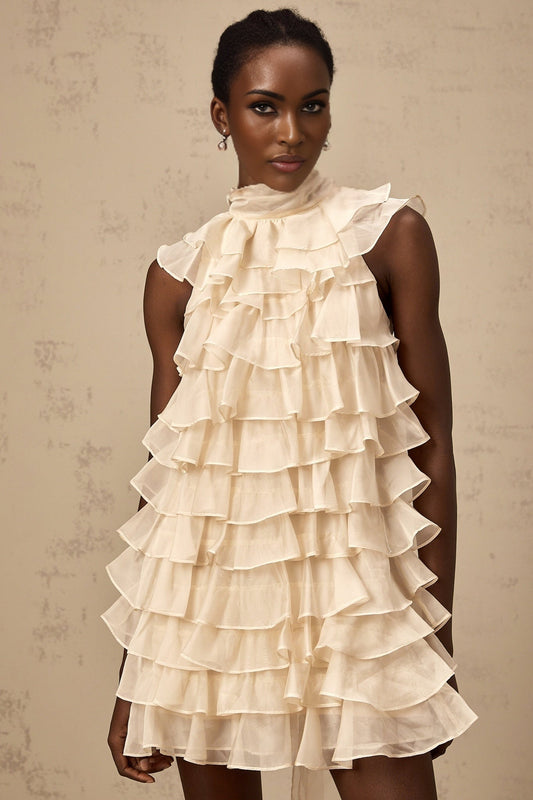 A sleeveless mini dress with tiered flounce design named Jessica featuring multiple ruffled layers and a short hemline