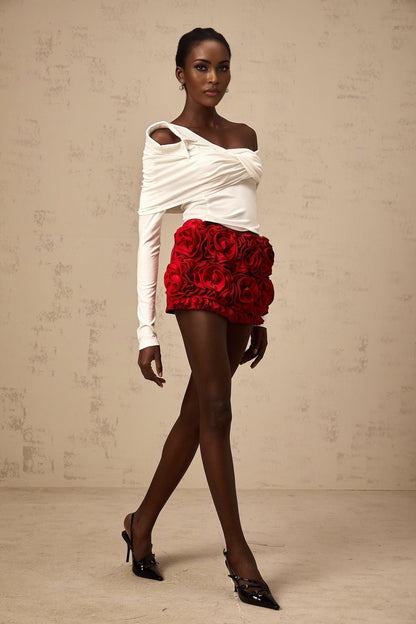 White asymmetric sleeveless top with twisted jersey fabric and draped neckline