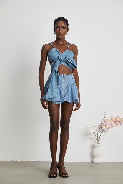Light blue denim skirt with ruffled hem and flared silhouette