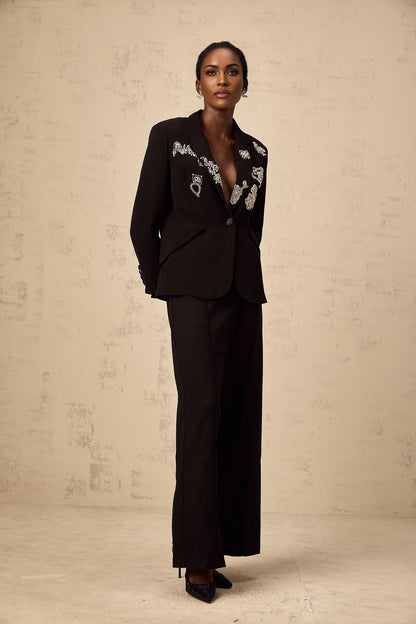 Black blazer with intricate bead embroidery detailing named Ximena