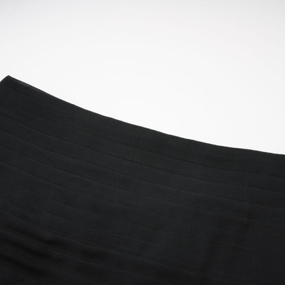 Long flowing maxi skirt with ruffled layers and pleated tulle detail in a soft rayon fabric